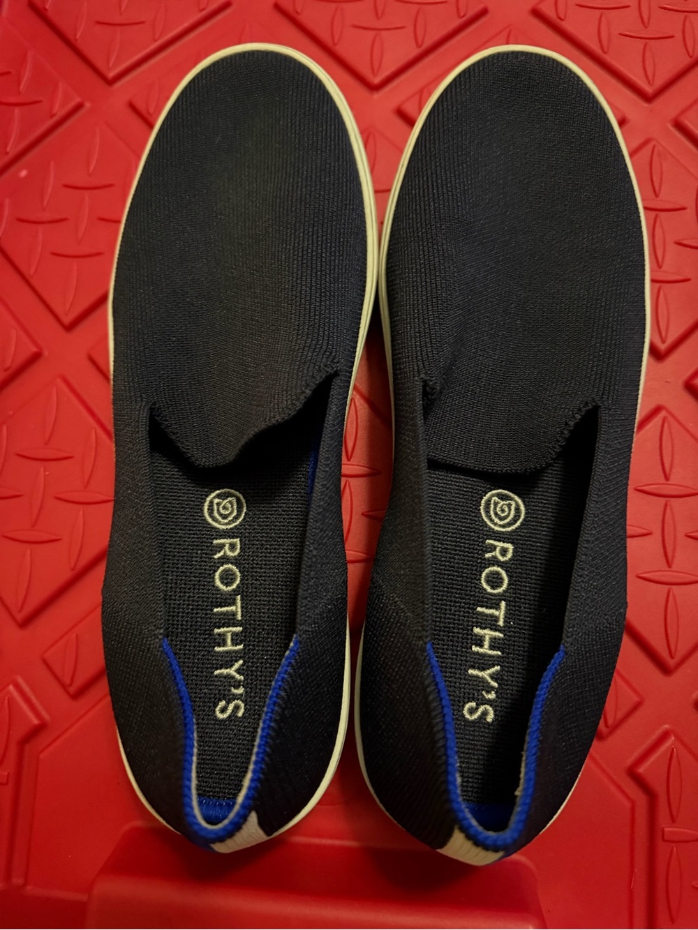 Rothy's Black Slip-On with Blue Trim
